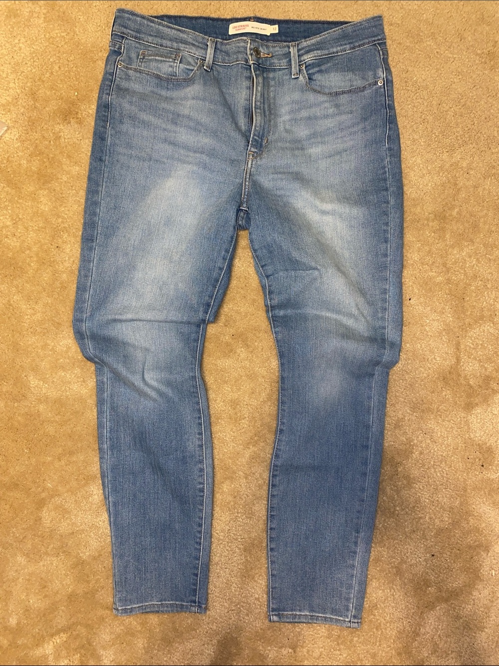 NWOT! Mid- rise, skinny- mid wash jeans